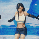 a woman in a white top and blue skirt stands in front of a blue background