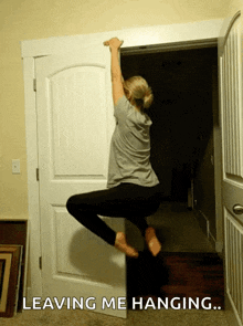 Hanging On Holding On GIF