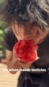 a person eating a slice of watermelon with the words me when moods testicles below them