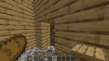 a screenshot of a video game with a wooden wall
