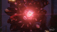 a group of people putting their hands together in a circle with a disney + logo in the background