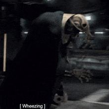 a person in a dark room with the words wheezing written on the bottom