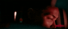 a close up of a person 's face with the word brothers written on the bottom