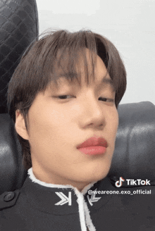 a close up of a person 's face with a tiktok watermark on it