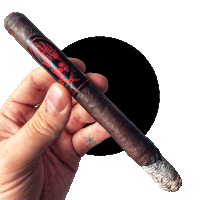 a hand is holding a cigar with a black label that says ' devil ' on it