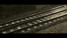 a train track with a few tracks that are very narrow