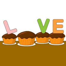 a row of cupcakes with the word love on top
