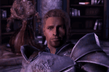 a man in armor with a shield on his chest
