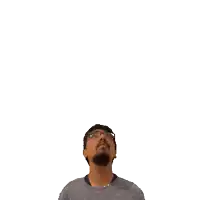 a man with glasses and a beard looks up at the number ten