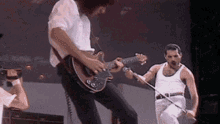 Freddie Mercury Live Aid GIF - Freddie Mercury Live Aid Concert GIFs