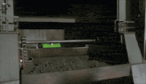 a machine with a green screen that says ' i 'm a robot ' on it