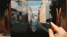 a painting of a city street is being made by animatica