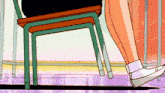 a person is sitting on a stack of chairs with their legs crossed