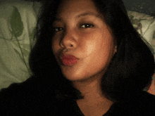 a close up of a girl 's face with red lips