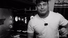 a black and white photo of a man with a gifrun.com logo on the bottom right