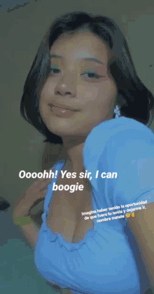 a woman in a blue top with the words i can boogie boogie woogie all night long