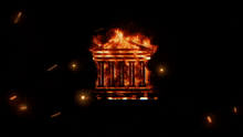 a building that is on fire and has the word justice on it