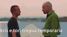 two men standing next to each other with the words kris e tori tregua temporanea written on the bottom