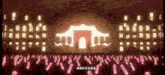a group of people are standing in front of a stage with a building in the background that says ' chinese ' on it
