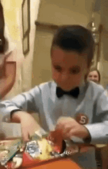 Not Impressed Birthday Fail GIF - Not Impressed Birthday Fail Unwrapping Present GIFs