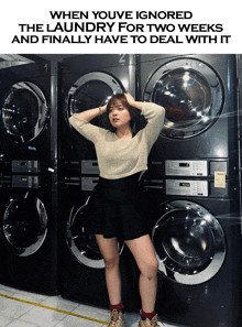 a woman standing in front of a stack of washing machines with the caption when youve ignored