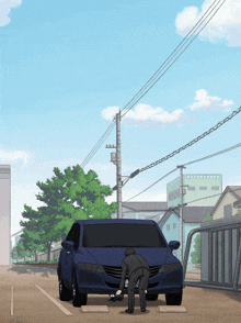 a man in a suit is kneeling down next to a blue car