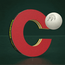a ping pong paddle with the letter c on it