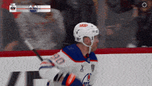 a hockey player wearing a white helmet with the word skip on it