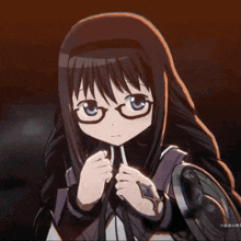 a close up of a girl with glasses and a light shining on her head