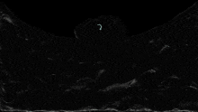 a black background with a white outline of a person 's face on it .