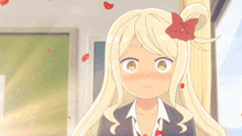 a girl with blonde hair and a red bow on her head