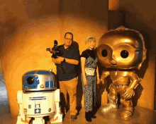 pose taking picture get ready c3p0 r2d2