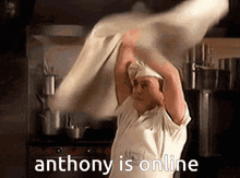 a man in a chef 's hat is holding a large piece of dough over his head with the words anthony is online below him