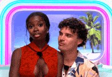 a man and a woman are standing next to each other in front of a tropical background