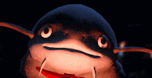 a close up of a cartoon fish with a red mouth