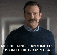a man with a mustache is checking if anyone else is on their 3rd mimosa