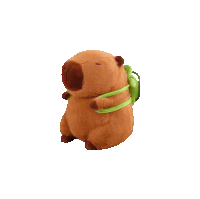 a stuffed animal of a capybara with a green scarf around its neck .