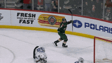 a hockey game is being played in front of a fresh when you need it sign
