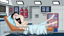 a cartoon of a man in a hospital bed with the letter n on his shirt