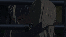 a couple of anime characters hugging each other in the dark