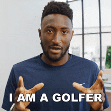 a man wearing a blue shirt says i am a golfer