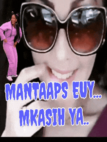 a woman wearing sunglasses with the words mantaaps euy mkasih ya
