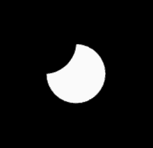 a black and white image of a partial eclipse of the sun
