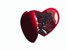 a pair of heart shaped sunglasses with a picture of a blue haired character