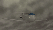an airplane is flying through a cloudy sky with a blue stripe on the nose