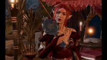 a woman with red hair is holding a knife in her hand