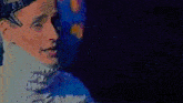 a man in a space suit is wearing a collar and goggles .