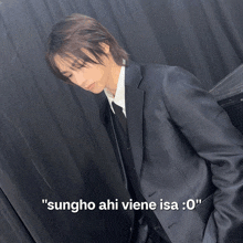 a man in a suit and tie with the caption sungho ahi viene isa