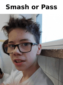 a boy wearing glasses and a white shirt with the words smash or pass below him
