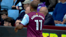 a soccer player named agbonlahor is wearing a number 11 jersey